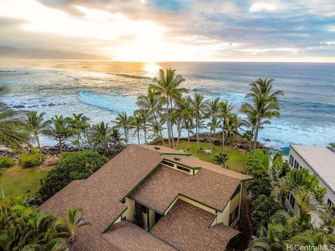 Welcome to 61-167 Iliohu Place! This magnificent oceanfront property offers a rare opportunity to immerse yourself in the beauty of the North Shore. With 5 bedrooms & 3 bathrooms spread across 2,557 square feet, this home provides ample space for rel...