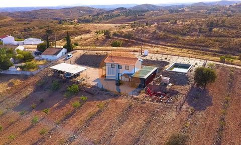 Land with 37,800m², with a warehouse, water tank and borehole, in the town of Corte António Martins in Tavira. Warehouse with several rooms, three bathrooms, two living rooms, porch, two storage rooms, two kitchens. The Warehouse has a fire alarm sys...