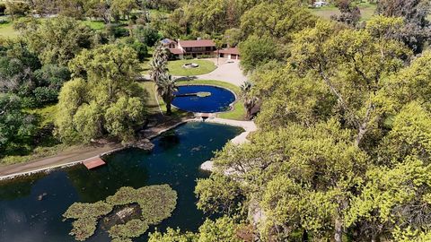 Walker Ranch is a one-of-a-kind 20-acre property in Yokuts Valley in Fresno County. Near CA-180 along the route to Sequoia Nat'l Park, this secluded turn-key property includes a striking custom home, extensive ponds and ranch facilities. In a private...
