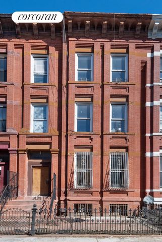 Welcome to this spacious 3-family townhouse nestled along a charming tree-lined street in the heart of prime Bed-Stuy. Built in 1899, this historic gem exudes character and offers a blank canvas for your architectural dreams. Spanning three floors wi...