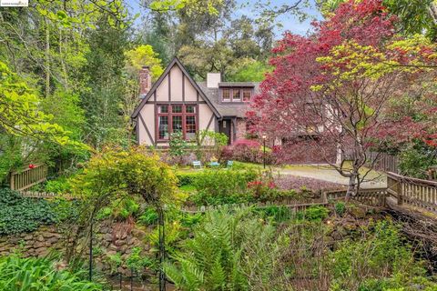 Open houses 3/30 10a - 5p, 3/31 2-4:30, 4/6 11-2 & 4/7 11-2. Welcome to this exquisite Tudor home, where yesteryear charm meets modern comfort. Beyond wrought iron gates lies a lush landscape, setting a serene creekside ambiance. Architectural splend...