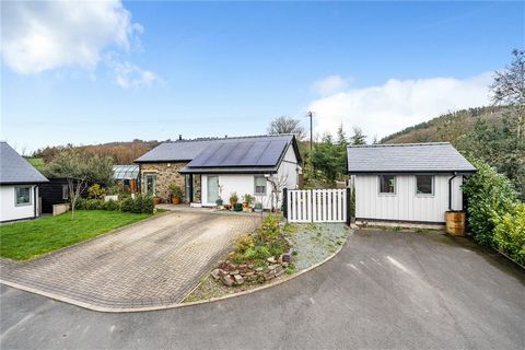 An opportunity awaits to acquire a distinctive two-bedroom detached bungalow situated in the picturesque hamlet of Evenjobb. Boasting air source heat pump technology, solar panels, an appealing garden, and ample parking, this property offers both sus...