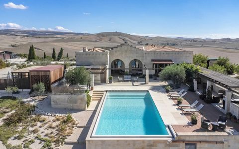 Designed and built with love in 2010 by an award-winning architect. Its private driveway leads you to its neutral solid stone walls that blend beautifully into the natural landscape. Framed by shaded vaulted cloisters, your view of its magnificent in...