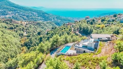 This 500 m2 luxurious villa is located in the serene and prestigious Tepe district of Alanya, offering unparalleled sea, nature, and castle views. Designed to provide the ultimate comfort and style, this villa features 9 bedrooms, 1 spacious living r...