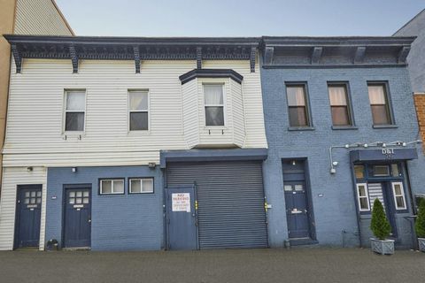 Comprised of residential and commercial units, this 50-foot wide, Greenwood Heights mixed use building with garage space is an outstanding opportunity for investors, developers or owner-occupiers. The first floor, distinguished by soaring ceilings, i...