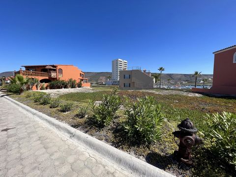 Build your dream home on this 4200 sq ft lot in the gated community of Puerto Salina in the Ensenada Municipality. This quiet and exclusive community offers direct access to a year-round sandy beach and features 24/7 guarded access, wide paved and cu...