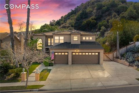 Nestled in the tranquil foothills of the Santa Ana Mountains and just a stone's throw from Yorba Linda, this exceptional residence offers unparalleled privacy, with a single neighbor and a generous cul-de-sac setting that includes motor home parking....