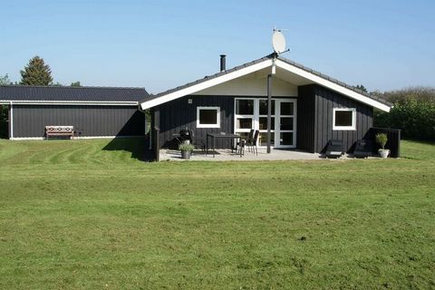Holiday cottage in the family-friendly Jegum Ferieland ca. 10 minutes drive from the North Sea. The kitchen has all modern appliances and is open to the living room which has a good lighting. The bathroom has a sauna and a whirlpool. There is an extr...