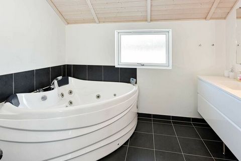 Holiday home with whirlpool located in scenic surroundings by Kvie Lake. The house is brightly decorated and suitable for both 1 and 2 families. Kitchen in open connection to the living room, which is furnished in a modern, Scandinavian style. There ...