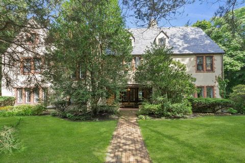 Reimagine your lifestyle-a 40 minute ferry ride from the Jersey Shore to Wall Street! Rare opportunity to own this stunning home, tucked away on private road in Historic District of Monmouth Hills. Breathtaking Tudor Revival, gracefully set atop a bl...