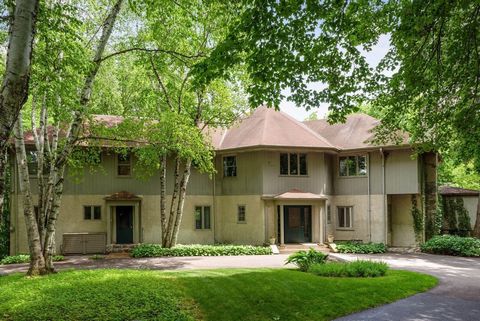 An incredible opportunity to capture the last great estate site in Wayzata! A winding wooded private drive brings you to a large home overlooking a small quiet bay leading into Lake Minnetonka, with a dock for lake access and recreational enjoyment. ...