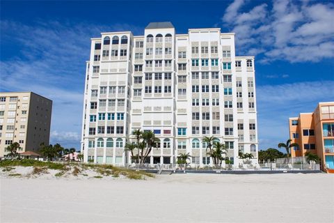 Indulge in the picturesque ambiance of St. Pete Beach by claiming your own slice of paradise on the sandy shores. Revel in partial views of the Gulf of Mexico and the intercoastal waterway from the fourth-floor vantage point of this high-rise condomi...