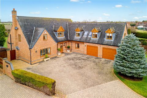 A fine, substantial property with five bedrooms, one downstairs and almost all en suite, provides comfort, elegance and copious amounts of space with its generous, light-filled rooms. Exceptionally well presented, in addition there is a fully fitted ...