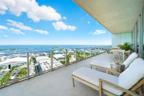 Nestled in the heart of Coconut Grove in the highly-sought after Grove at Grand Bay condominium, this 4-BD, 3.5-BA unit offers endless water views and a unique living experience for the most discerning buyers. Encompassing 4,933 SF with 12-ft floor-t...