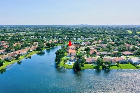 LOCATION & VIEWS!!!!! PARADISE LIKE, QUIET SETTING! Amazing Neighborhood with Pool, Park, walking trails, On a Huge Lake with fishing and kayaking right off the property back yard! Remodeled 4 Bedrooms / 3 Baths Open Concept Home, with beautiful Mode...