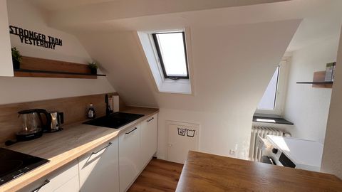 Welcome to my lovingly renovated attic apartment in Aschaffenburg Damm! Just a 5-minute walk from the main train station and downtown, you'll find a completely renovated apartment with a dreamy, stylish bathroom and perfect kitchen. Equipped with a w...