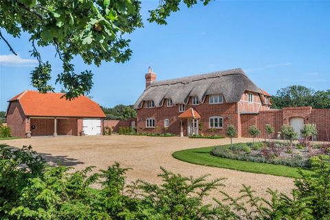 A picturesque and luxuriously appointed eco-efficient new build family home, to include a two-bedroom converted barn and attached cottage, garaging and stables, situated within the New Forest National Park on a private and peaceful plot of approximat...