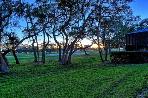 Under contract-accepting backup offers. This move-in ready, maintenance free, golf course villa in the Bay Isles Harbour Oaks community on south Longboat Key is a golfer’s dream! Experience the exclusive coastal lifestyle and savor scenic golf course...