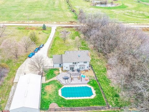 Drum roll please. The winner of the academy award for location, location, location is this stunning 4 Bedroom 2.5 Bath, 2500+ sf, home on 4.97 acres with an elegant in-ground pool, deck, and massive outbuilding. This property is just west of 169 high...