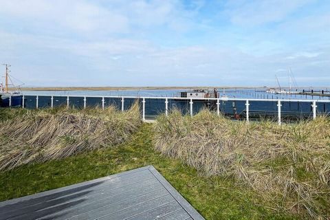 Appartement de vacances moderne et confortable avec accès pour fauteuil roulant au rez-de-chaussée avec vue sur la mer Baltique et le port de plaisance confortable. L'appartement dispose d'un coin nuit ouvert avec lit double, d'une salle de bain avec...