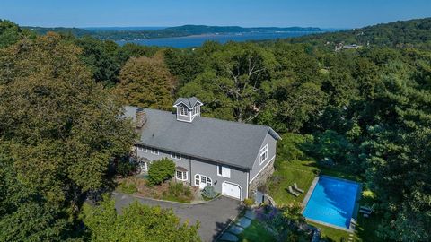 Welcome to this beautifully renovated 'one of a kind 19th-century gem nestled in the heart of Hastings on Hudson. This historic home, originally built in the 1800's, has been meticulously restored while preserving its timeless character and architect...