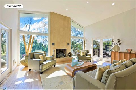 This Sag Harbor Village contemporary is infused with light and exquisite design. When first entering the residence you'll be struck by the architectural custom white oak staircase in the atrium, connecting two distinct parts of the house. Designed to...