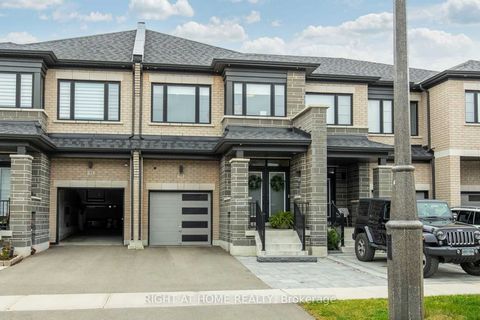 Welcome to your dream home in the heart of Kleinburg! This stunning 2-storey freehold modern townhouse features 9 ceilings throughout main floor & 2nd floor, and 1,808 square feet of open-concept living flooded with natural light. Enjoy a large kitch...