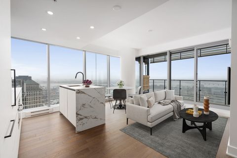 Brand new 2-Bedroom South/East corner unit in Victoria sur le Parc, the absolute pinnacle of Montreal's luxury condo towers. Designed & constructed by renowned Montreal-based developer Broccolini, Victoria sur le Parc soars 57 storeys over the gatewa...