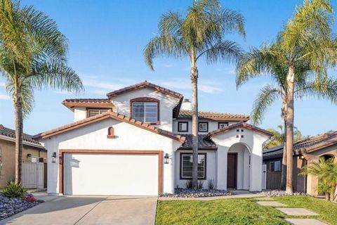 Welcome to this beautifully updated 5-bedroom, 3-bathroom home located in the desirable community of Chula Vista. Featuring a versatile floor plan with a bedroom and full bath on the first floor, this home is ideal for growing families, multi-generat...