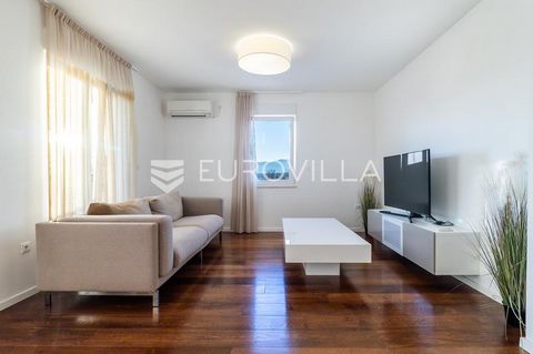 Rijeka, Marčelji, luxurious three-room apartment NKP 85 m2 with swimming pool. The apartment consists of an open space living room with dining room and kitchen. In the second part of the apartment there are two bedrooms, a bathroom, a hallway and a s...