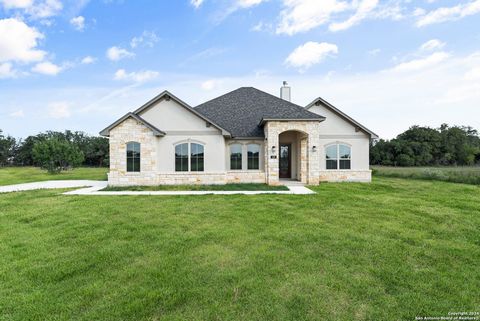 ***Ask about the builder's Flex Cash Rate Buydown incentive!***Welcome to this stunning 4-bedroom single-story Texas home in Floresville, featuring a charming stucco and stone exterior with a side-entry garage. Inside, you'll find luxurious LVP floor...