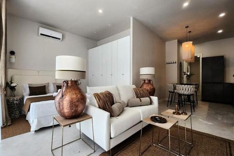 This stylish studio offers a serene escape, boasting a spacious and bright layout adorned with thoughtfully curated decor. Featuring a comfortable double bed and a private bathroom, it is ideal for solo travelers or couples. The property is equipped ...