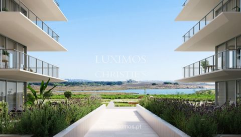 On the seafront , next to the beach and Lagoa dos Salgados , in Armação de Pera, in the Algarve, we find this modern three-bedroom apartment . The apartment is part of a new and exclusive development called Bayline . The apartment was designed to com...