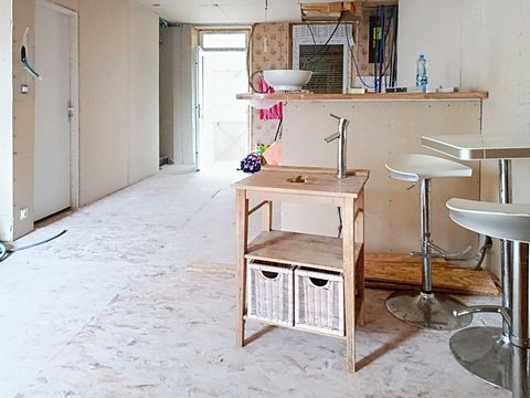 Maison avec jardin et potentiel à exploiter