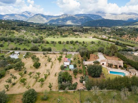 Buildable country plot just outside the town Campanet This large buildable plot, which is over 17.300m2 , is offered for sale in Campanet, with views of the Tramuntana mountains and stunning scenery. It is just 5 minutes from the centre of town, is p...