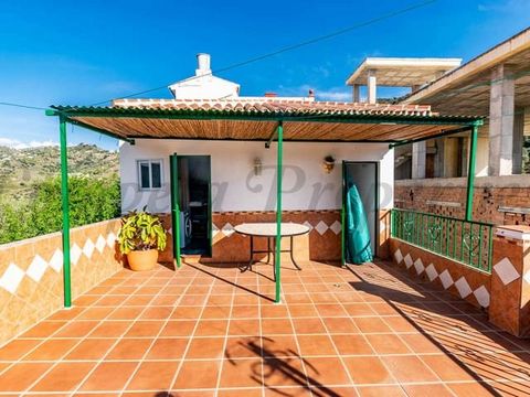 This lovely townhouse in Spain is situated in a peaceful street in the charming village of Sayalonga very close to all amenities. The inside is divided into two levels, the main floor consists of a livingroom, bathroom, kitchen and two bedrooms. A st...