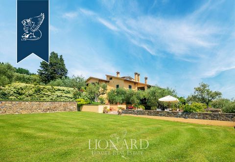 This luxury villa for sale on the Tuscan hills in Poggio a Caiano, in the province of Prato is the ideal property if you dream of living in a home surrounded by nature. It has been renovated with care and elegance, offering a panoramic view of its su...