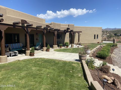 Welcome to this stunning southwestern home in Sunflower, AZ, offering the perfect blend of comfort & luxury. Nestled in a private gated community, this property boasts breathtaking mountain views and enjoys the great climate of Sunflower. This home f...