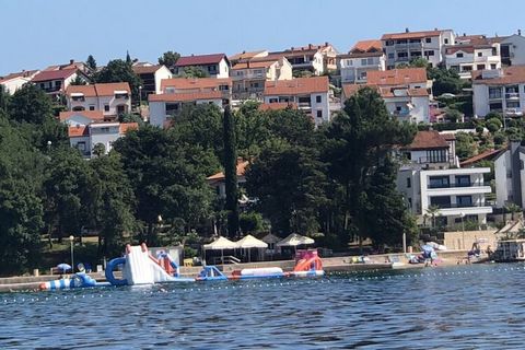 The holiday apartment for 4 people is located on the golden, beautiful island of Krk in the small fishing village of Njivice You live in 50m² in a prime, quiet location You live in a separate bedroom, kitchen-living room - comfortable pull-out sofa b...