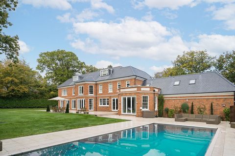 Situated in a highly desirable and leafy road on the Wentworth Estate, this stunning residence offers spacious and secluded accommodation within three quarters of an acre of south facing landscaped grounds. Built by Applegate Homes, this luxurious th...
