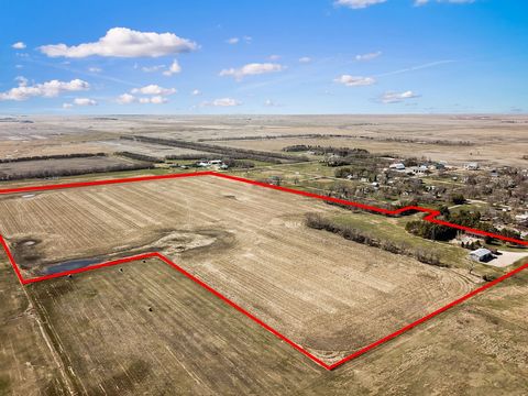 McPherson County 55 is located in the Southwest corner of Leola, SD. Containing approximately 55.26 +/- acres of agricultural land, 47.7 tillable acres with the balance being the farmstead, improvements, and shelter belts. This property is set up for...