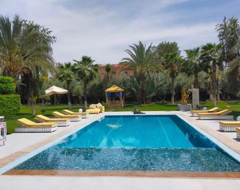 Located in Marrakech. Located on the road to Ouarzazate, in a secure residence, conveniently located, this sublime villa of art deco style is available for short term rental. It has a living area of 800 m² built on a plot of 5000 m². This charming pr...