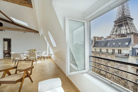 Paris 7th, top floor apartment What a stunning and highly stylish property, where the Eiffel Tower becomes part of the living space.... Apartment located at the foot of the Eiffel Tower on the Quai Branly in the immediate vicinity of the Musee du Qua...