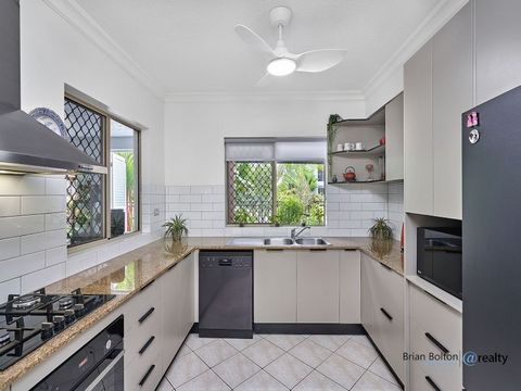 Welcome to your dream apartment in The Lakes Resort, Cairns North. This stunning two bedroom, two bathroom apartment is ground floor, open plan and flows beautifully out to your private entertaining area and private use garden. - Designer Kitchen + N...