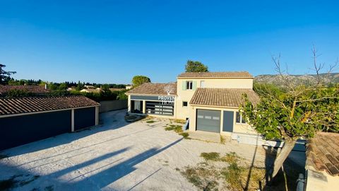 Provence Home, real estate agency, is offering to sell Within walking distance of Cheval-Blanc, a house built in 2015, with multiple outbuildings and a total surface area of approximately 285 sqm : a spacious showroom, offices, workshops and a two-ca...