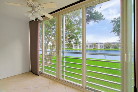 Now offering a stunning 2nd-floor unit with an enclosed patio showcasing water views and impact windows. The HOA covers basic cable, water, and fumigation. Revel in the elegance of this condo with tile floors throughout and an updated kitchen featuri...