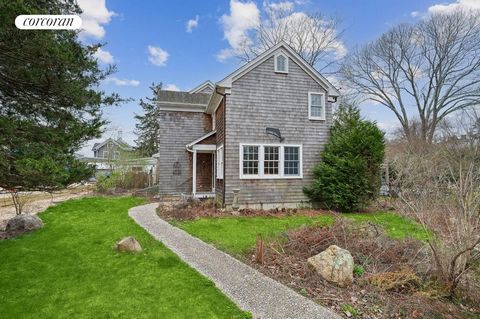 Located on one of Sag Harbor's quietest streets and just a few minutes distance from the heart of the village or Havens Beach and Marinas is this move-in ready 2 bedroom, 2 bath home with large accessory structure that can be used for a workshop, pot...