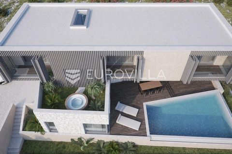 Island of Ugljan, Kali, building plot of 604 m2, with a building permit and a project for the construction of a luxury villa with a swimming pool. The plot is located in the immediate vicinity of the sea, only thirty meters away, with direct access t...