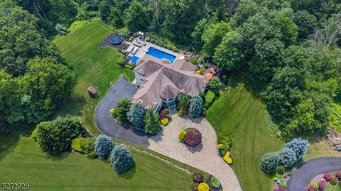 Your Private Resort Awaits! Embrace the perfect blend of elegance and modern living in this French-style colonial home at Raine Tree Estates. Situated on 3 acres, this picturesque property offers a retreat for relaxation, work, and play! Step into yo...