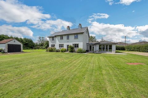 Spacious Family Farmhouse. This early twentieth century farmhouse, expanded and improved in recent years and adaptable to any living arrangement, is a place you can put down roots with confidence. With four/five bedrooms, five/six reception rooms, th...